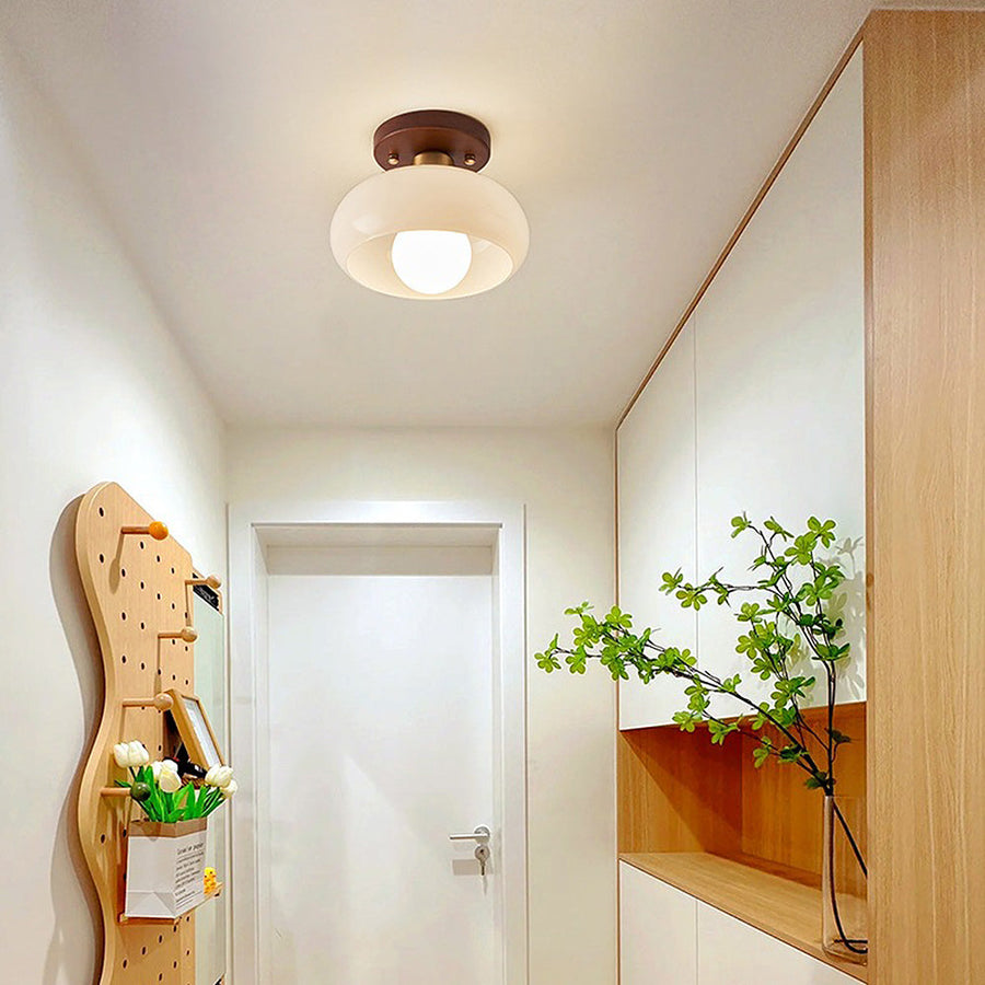 Ceiling lamp installed above a bedroom nightstand