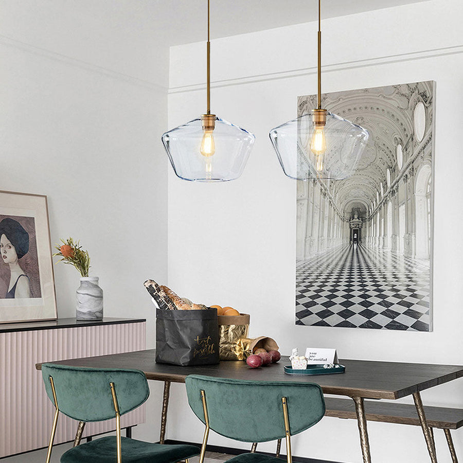 Side view of the pendant light showing its cord and mount