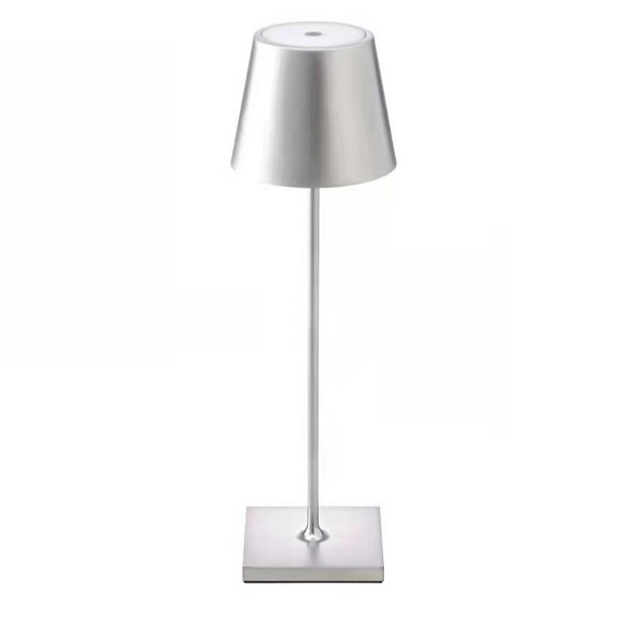 Minimalist table lamp glowing with warm white light