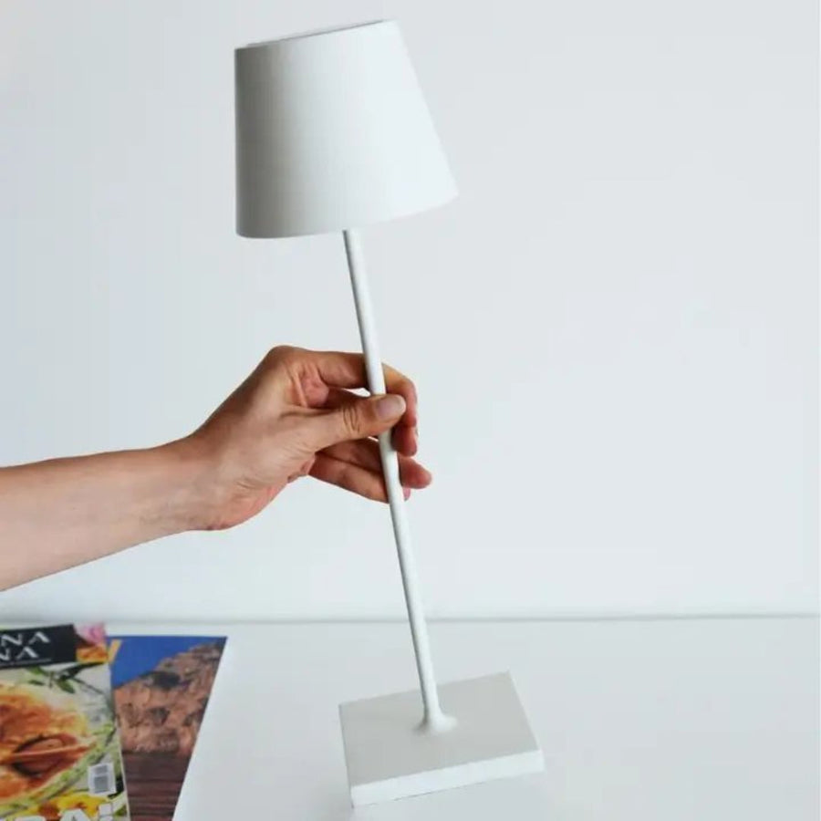 Touch dimmer control shown on the base of the table lamp