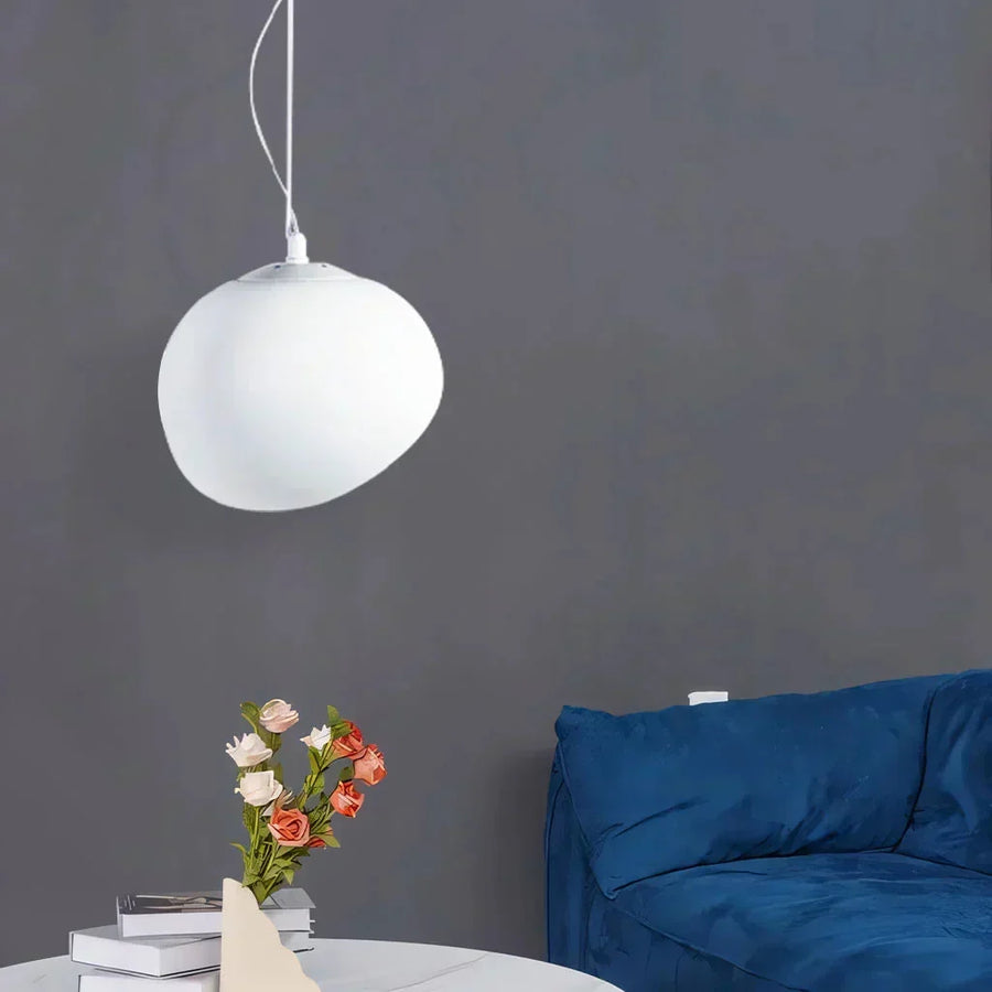 White Pebble pendant light glowing warm light