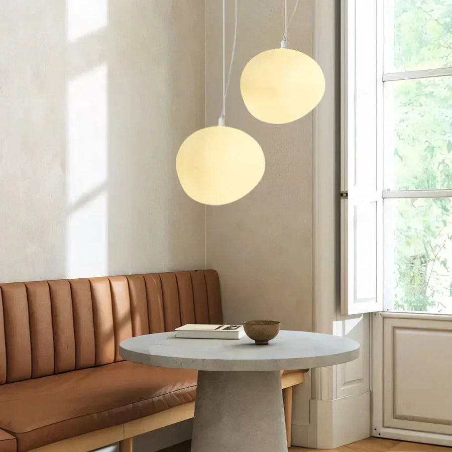 White Pebble pendant light shown from the side