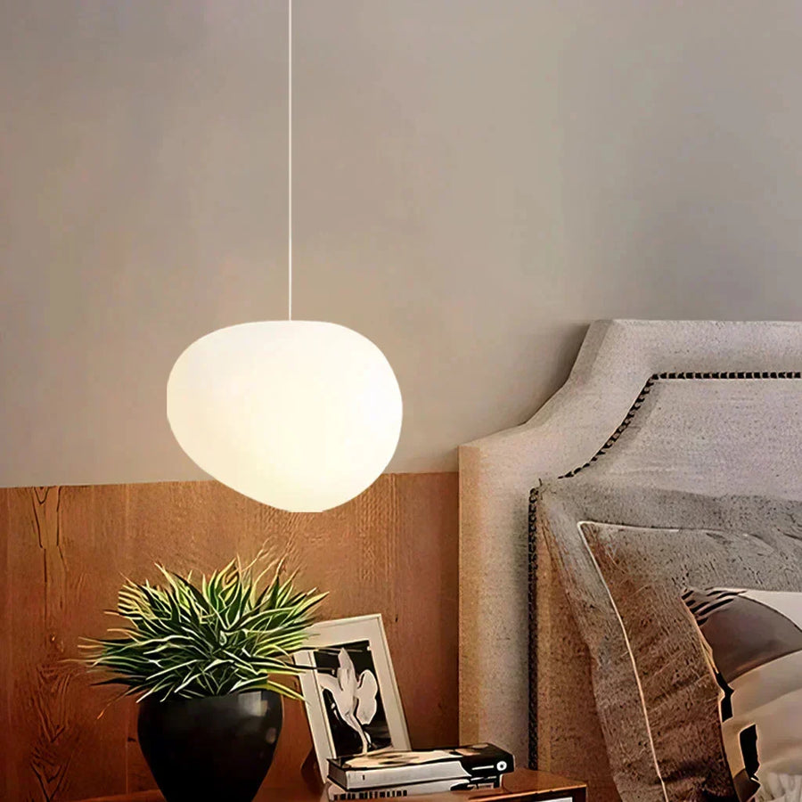 White Pebble pendant light in a bedroom setting