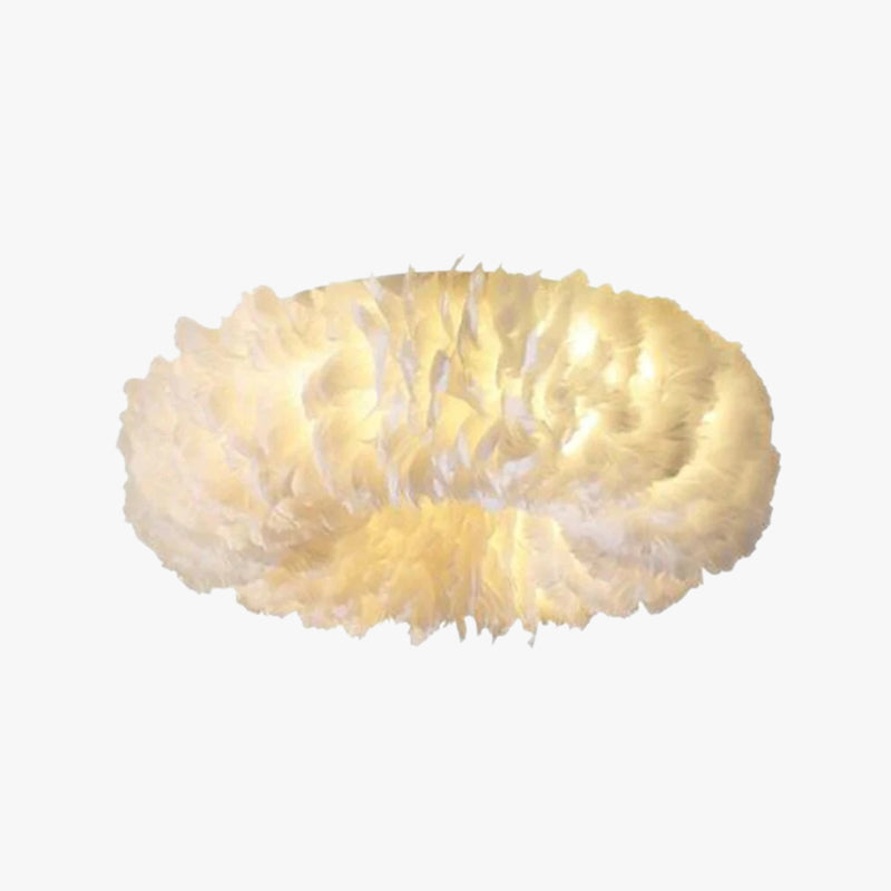 Boho LED ceiling lamp with feathers hanging in a bedroom
