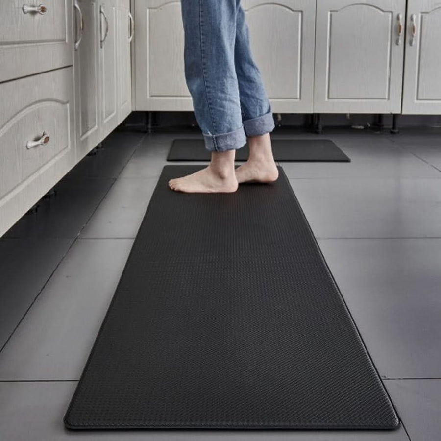 Light gray kitchen mat styled in a modern kitchen.