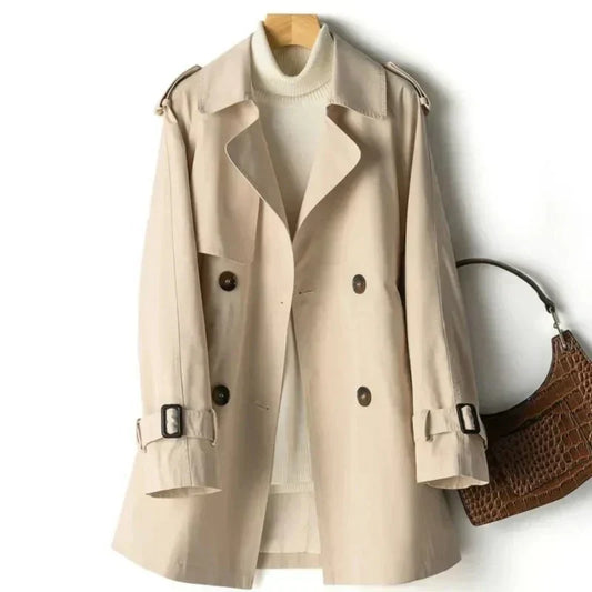 Woman wearing a black double-breasted trench coat