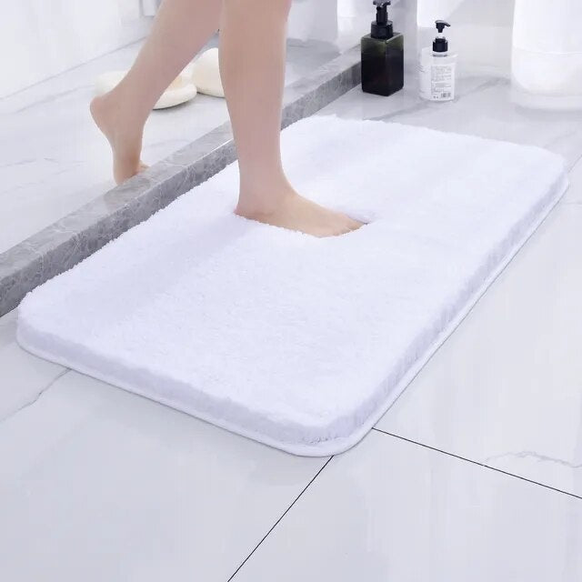 White bath mat with non-slip backing shown