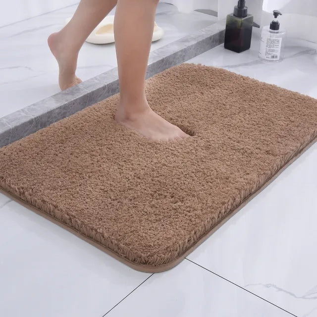 Camel-colored bath mat with plush surface