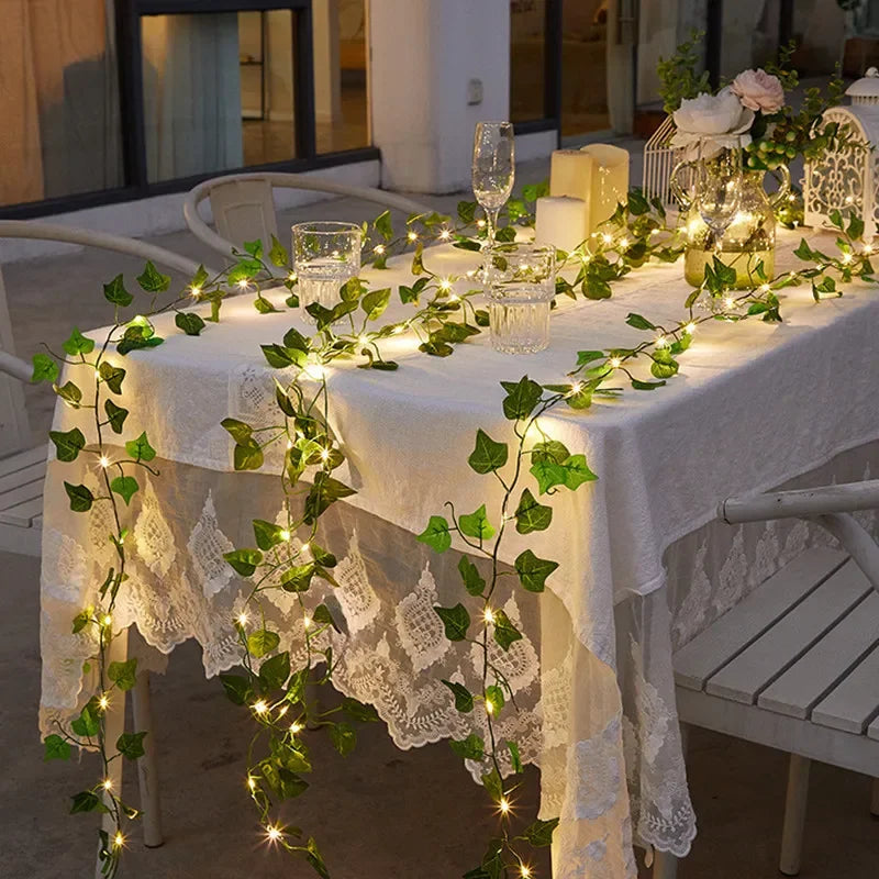 String lights with leaf details on a patio railing