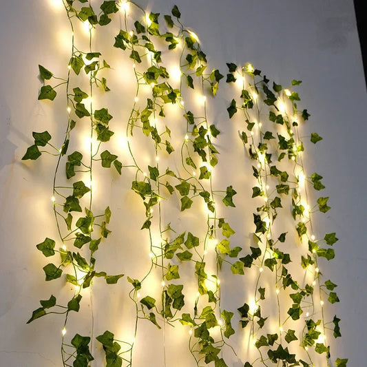 String lights with flower and leaf shapes hanging outdoors