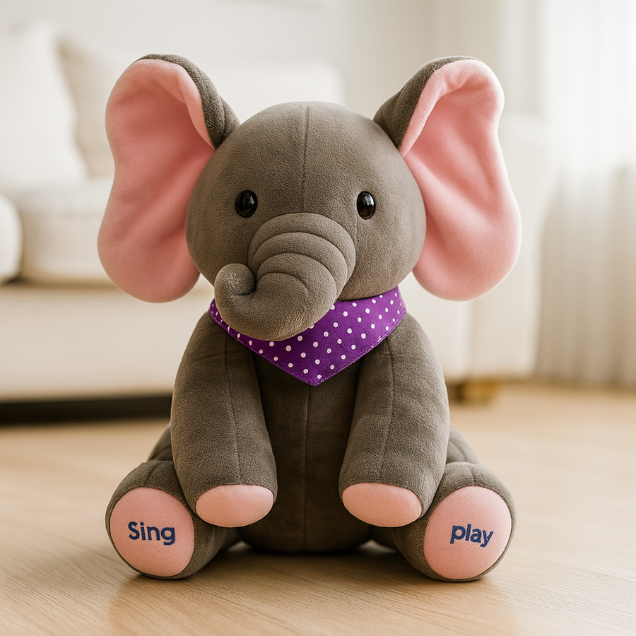 Child's stuffed elephant toy with plush gray fur and pink ear detail