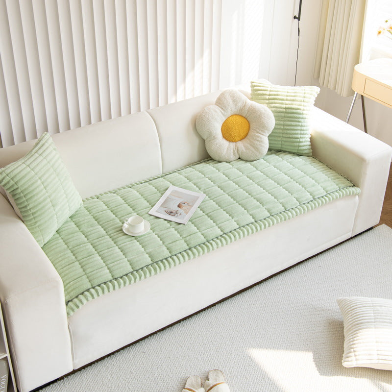Sofa styled with two matching corduroy cushions
