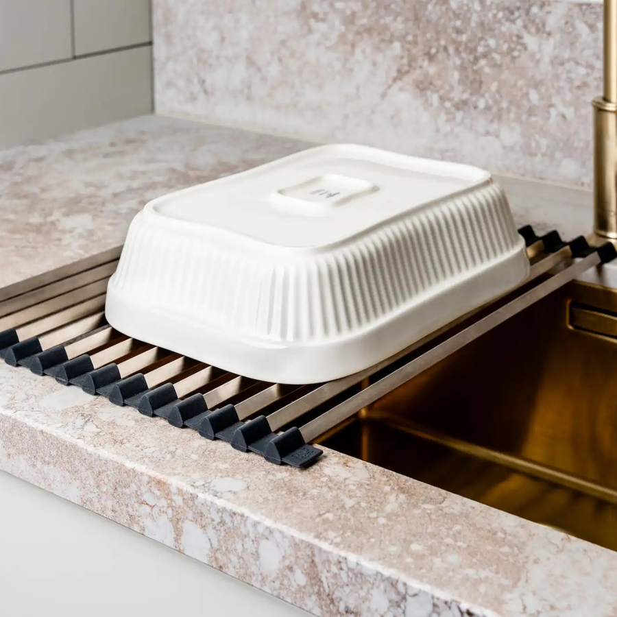 Folded dish rack shown compact for storage.