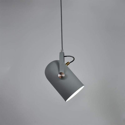 Scandinavian minimalist pendant lamp hanging in a kitchen