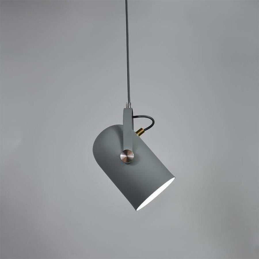 Scandinavian minimalist pendant lamp hanging in a kitchen