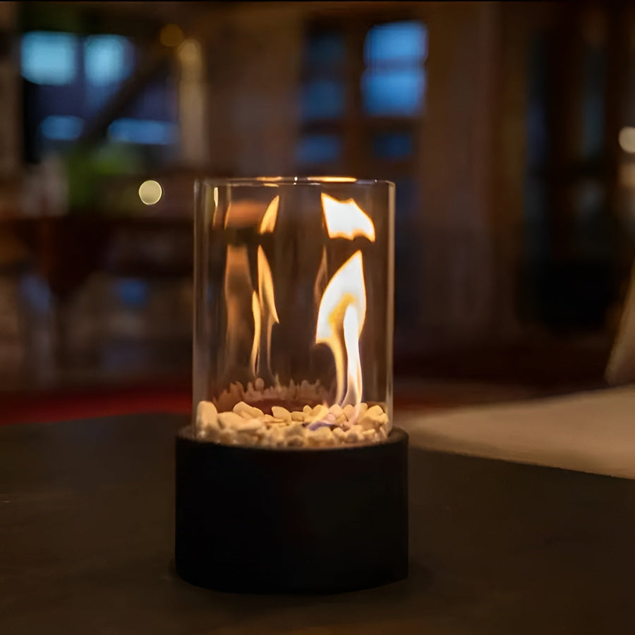 Round fire pit lamp placed on a nightstand