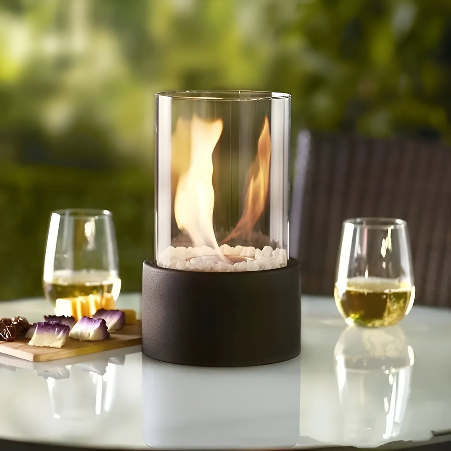 Tabletop fire pit glowing softly in a dim room