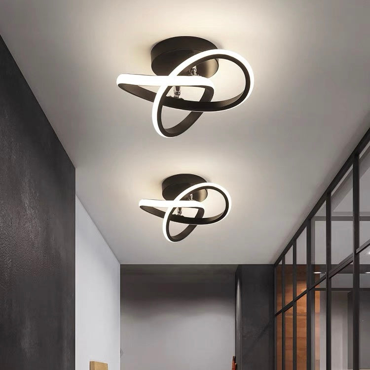 Modern geometric LED ceiling light mounted on ceiling