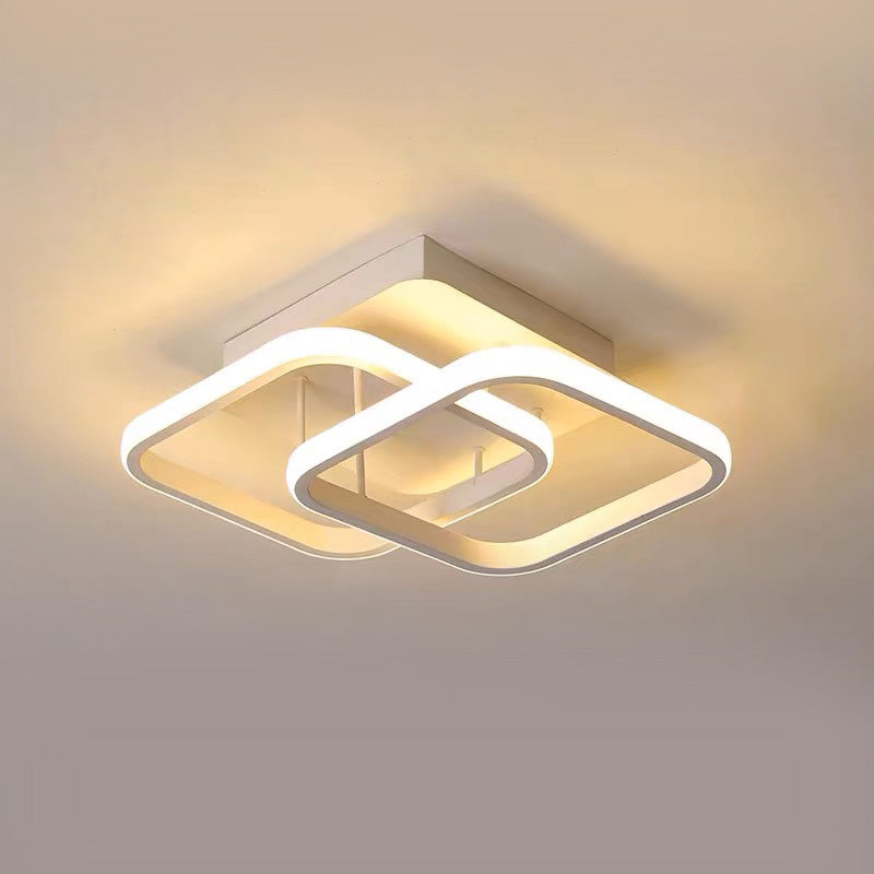 Modern geometric LED ceiling light in dining area