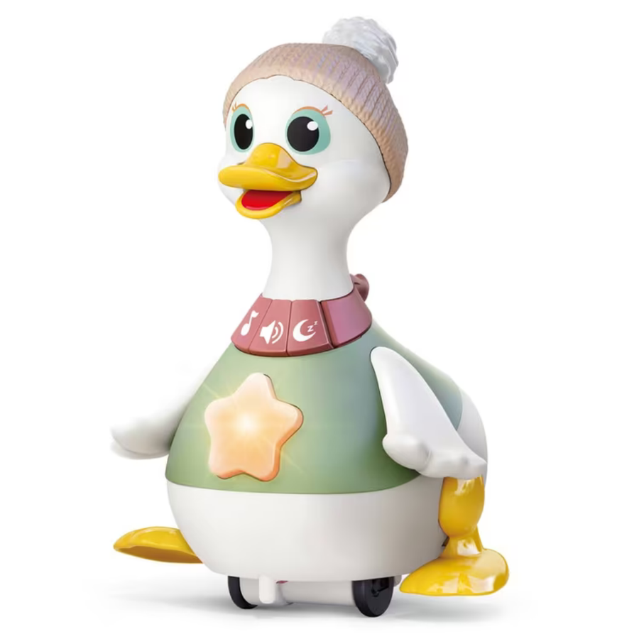 Baby reaching toward the duck toy on the floor