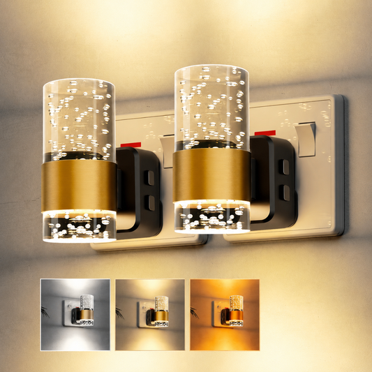 Two LED night lights plugged into wall outlets in a hallway