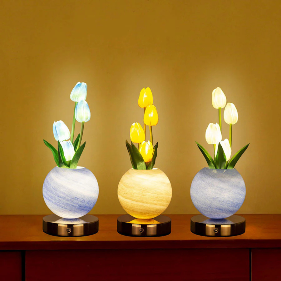 LED tulip table lamp with orange glowing flower shades