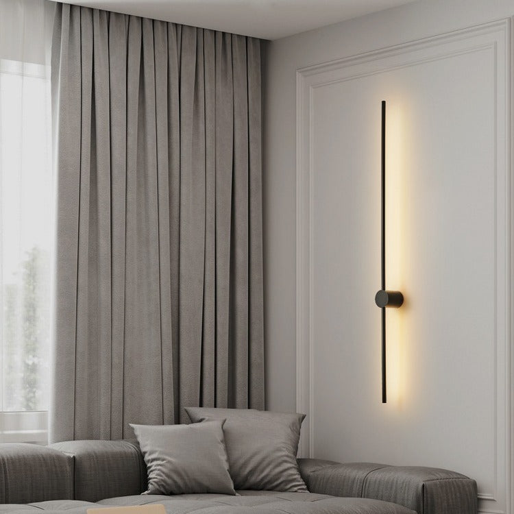Wall lamp mounted above a bed for ambient lighting