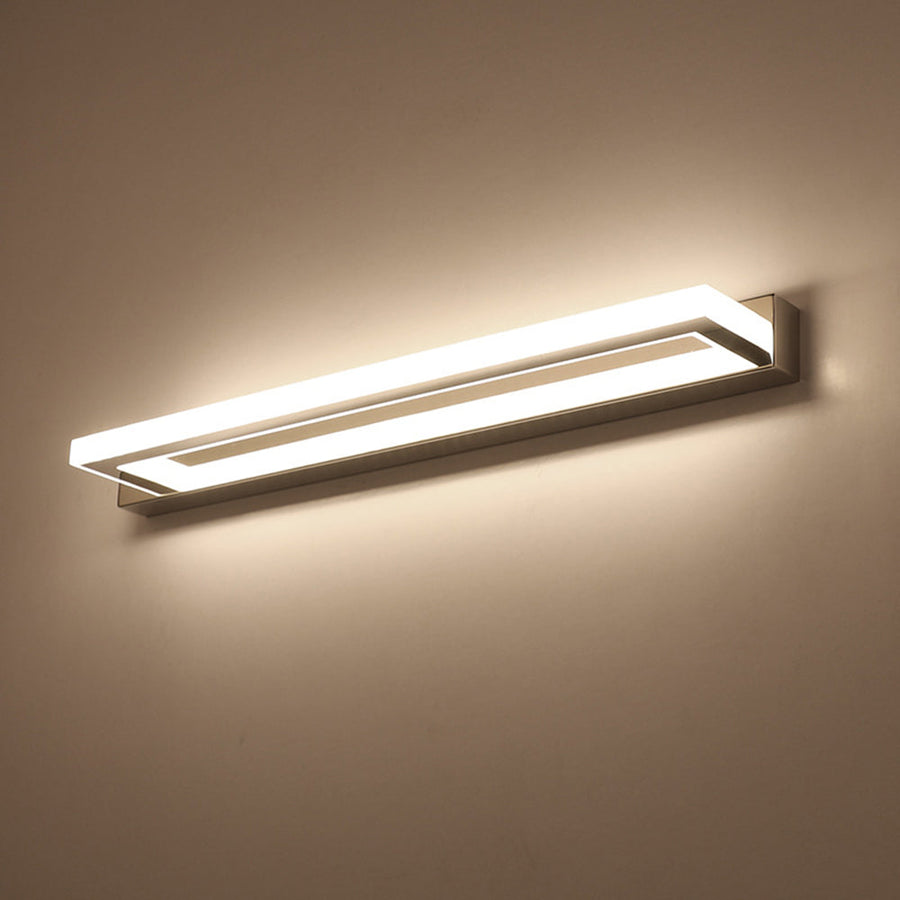 Minimalist rectangular LED wall light mounted on a wall