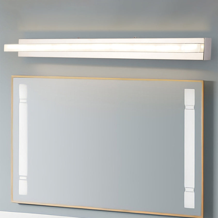 Minimalist LED wall light shown in a bedroom setting