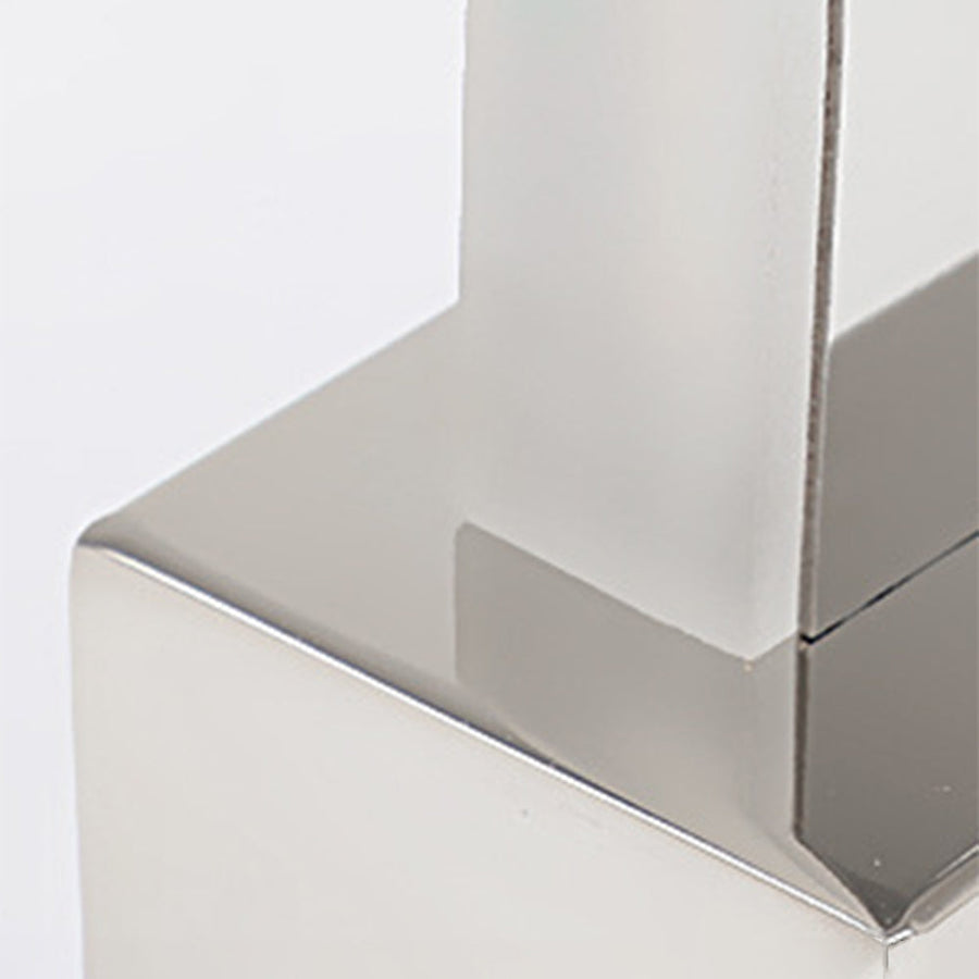 Minimalist rectangular LED wall light in a bathroom setting