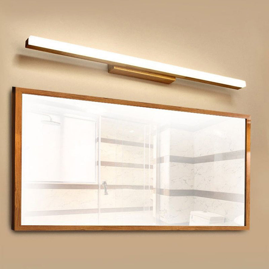 Wall sconce glowing with warm white light