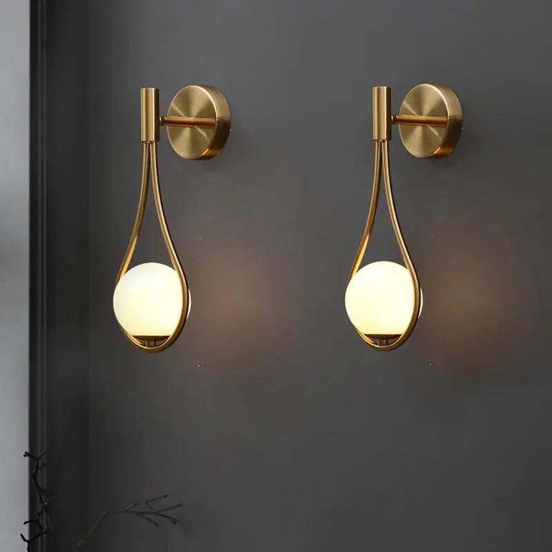Close-up of the wall sconce's warm white LED glow.