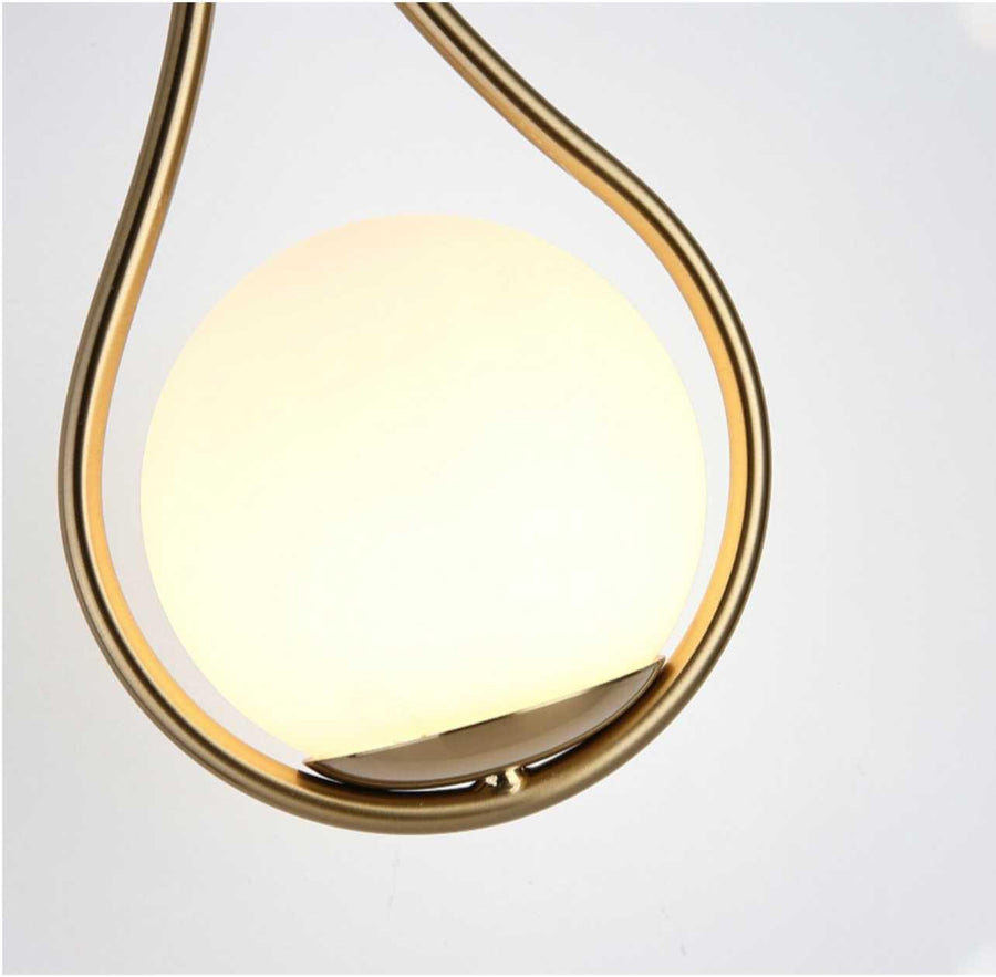 Wall sconce lit at night creating a cozy glow.