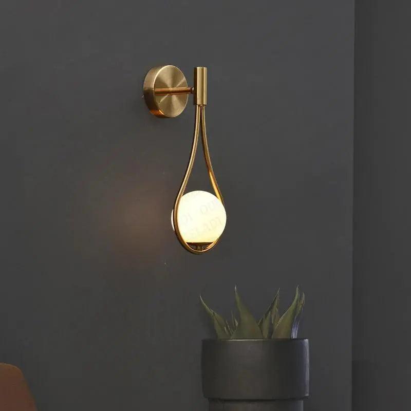 Front view of the wall sconce with light off.