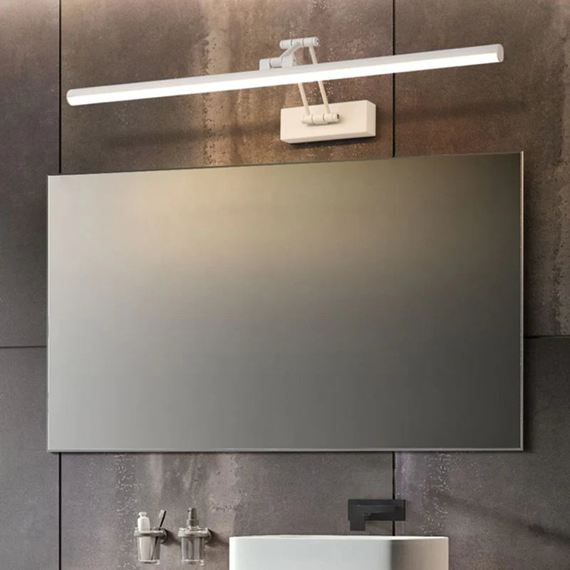 Wall lamp installed above a nightstand at bedside