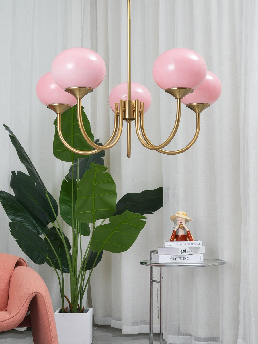 Chandelier illuminated in a dim bedroom