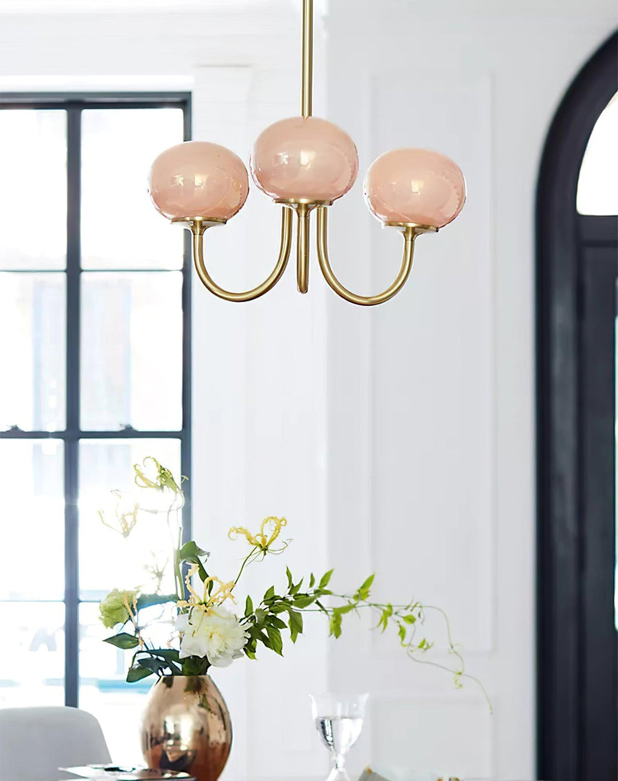 Angled shot of 3-head chrome chandelier