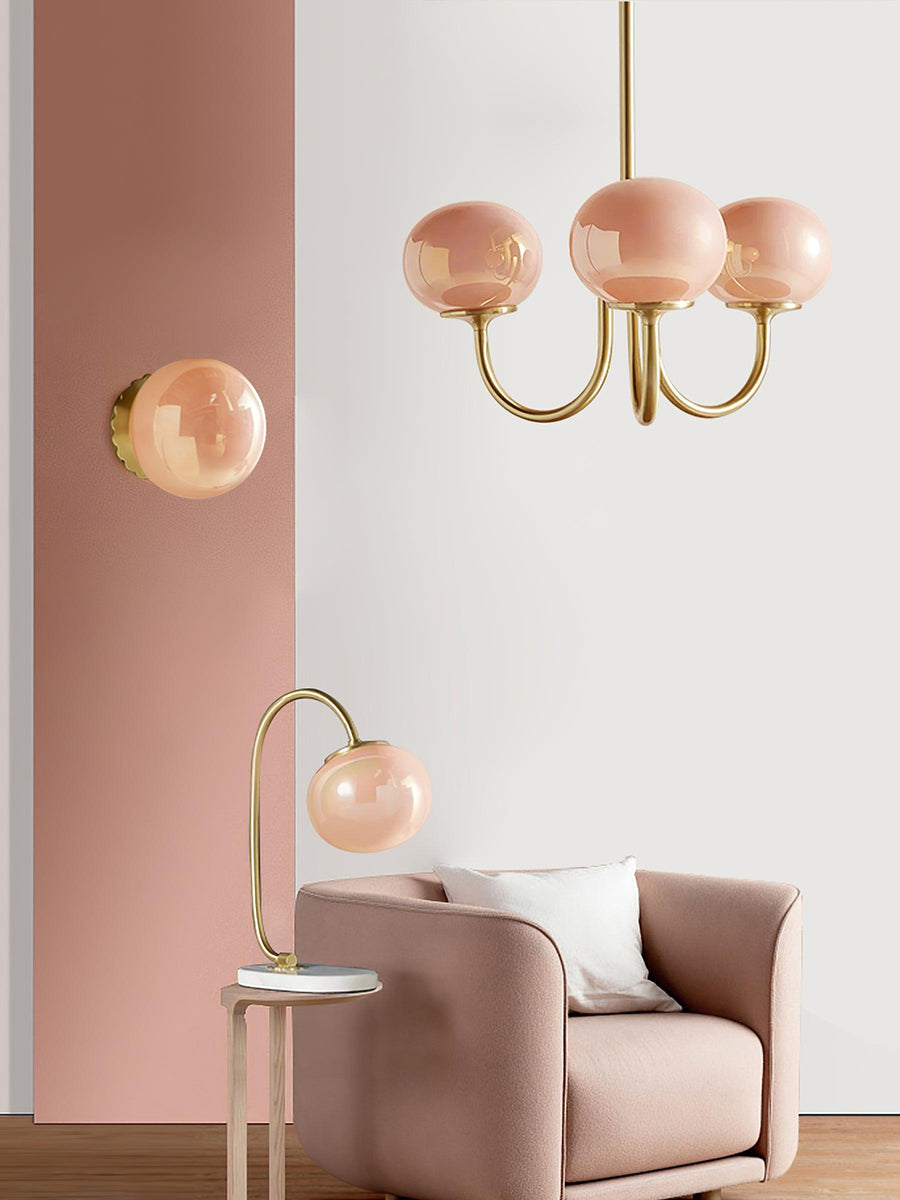 Chandelier hanging above a plush sofa