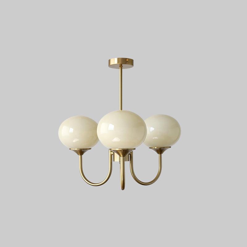 Chandelier hanging in a bright living room
