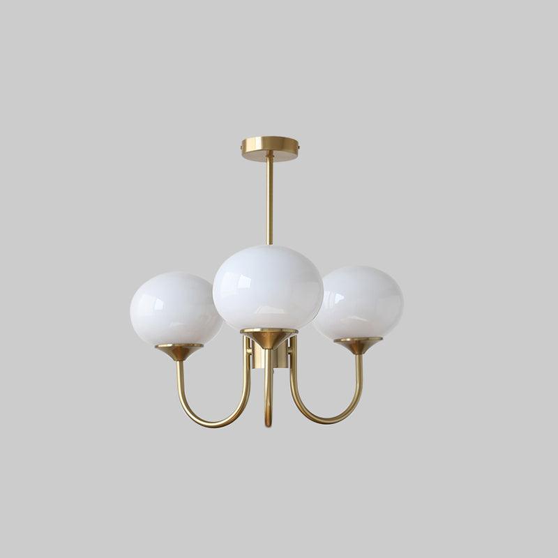 Close-up of chandelier's white glass shades