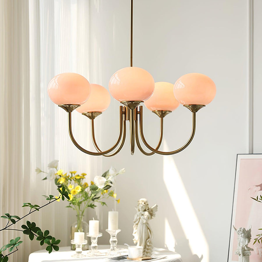 Chandelier mounted above a dining table