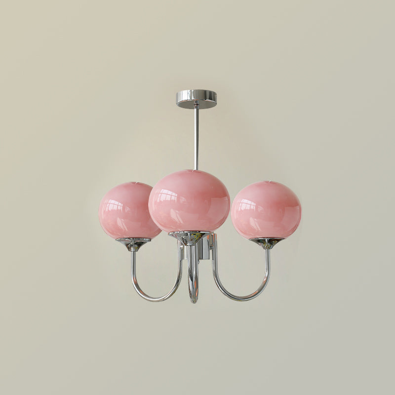 Chandelier lit softly above a dining set