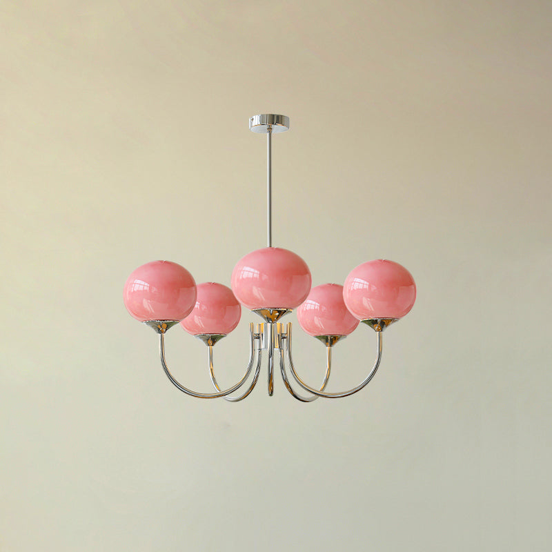 Close-up of chandelier's cream and chrome finish