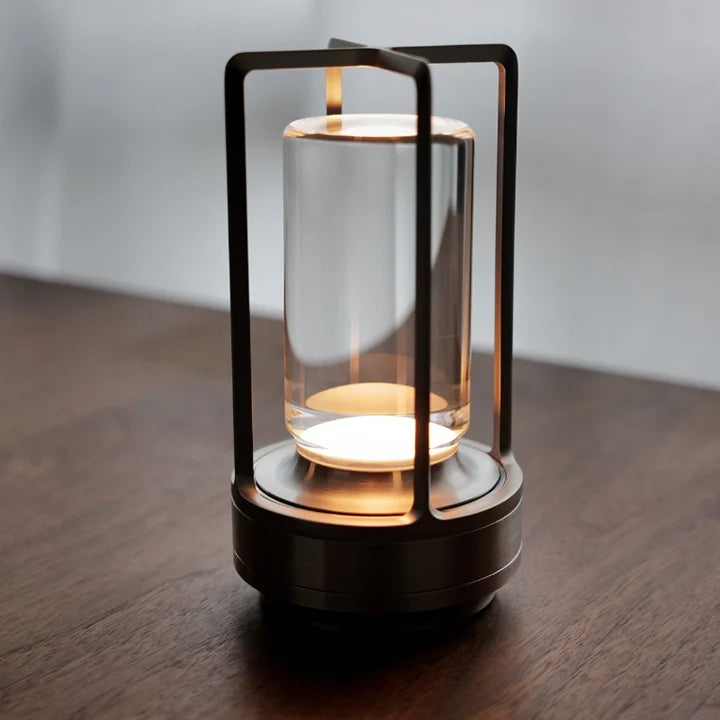 Table lamp shown in gold, silver, and black finishes