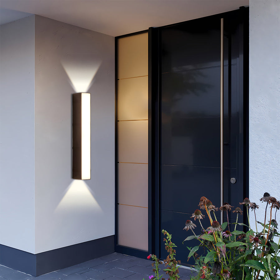 Outdoor wall light installed near a front entryway