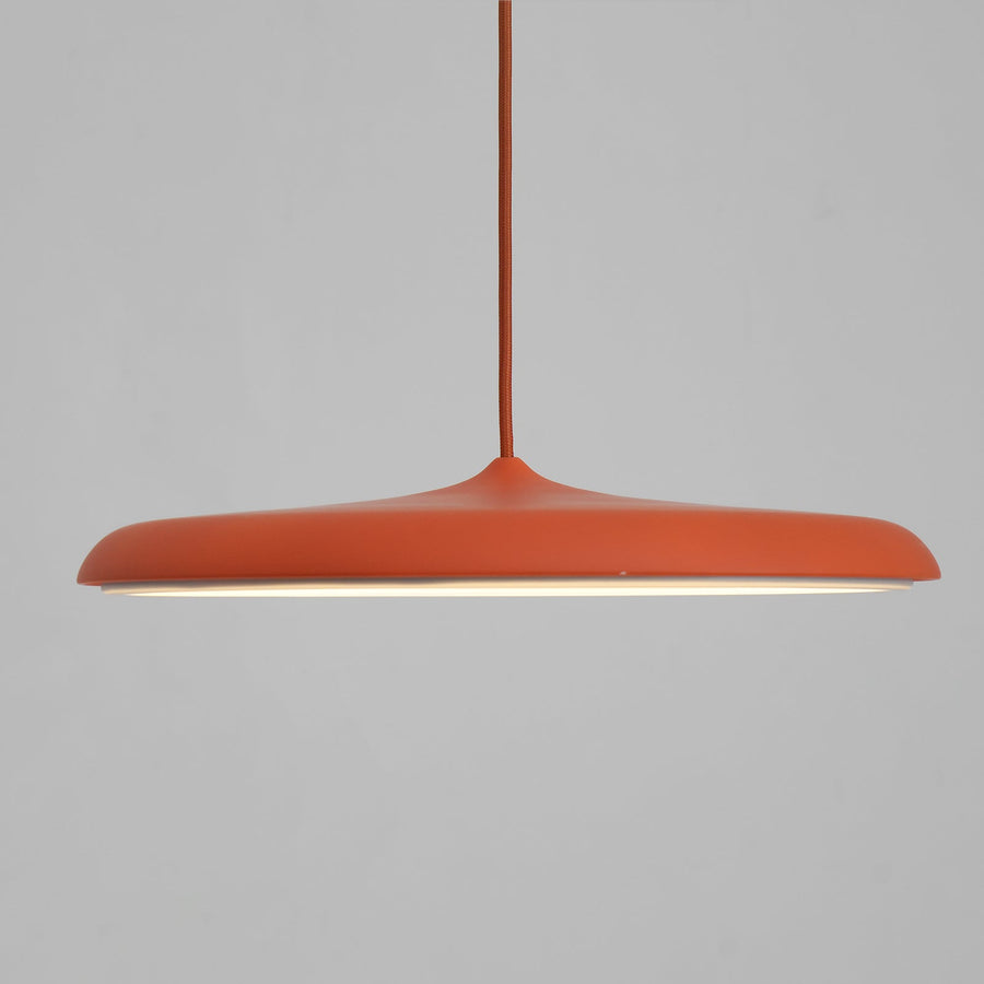 Pendant light illuminated in a living room