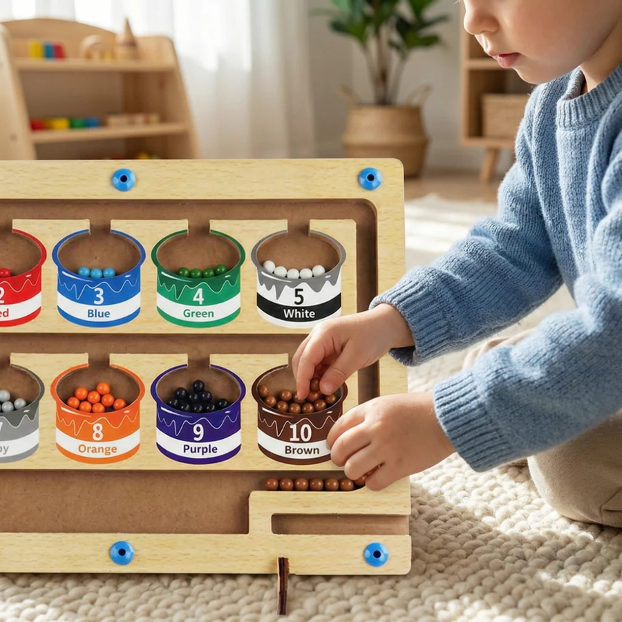 Close-up of the wooden board showing numbers and color slots.