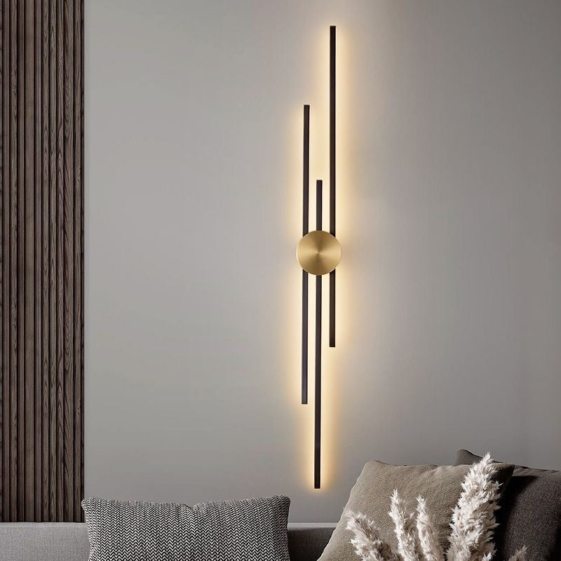 Close-up of the gold accents on the black wall sconce