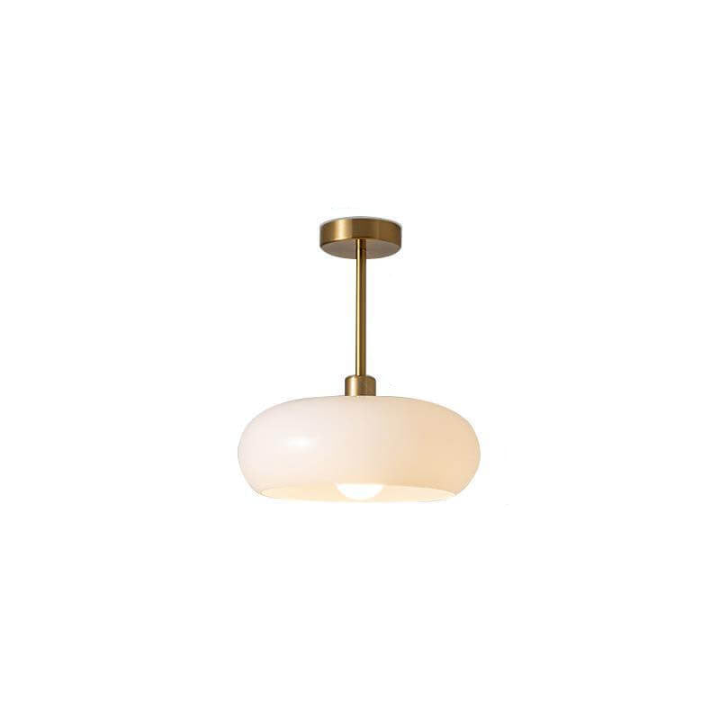 Amber glass shade on a round ceiling light fixture