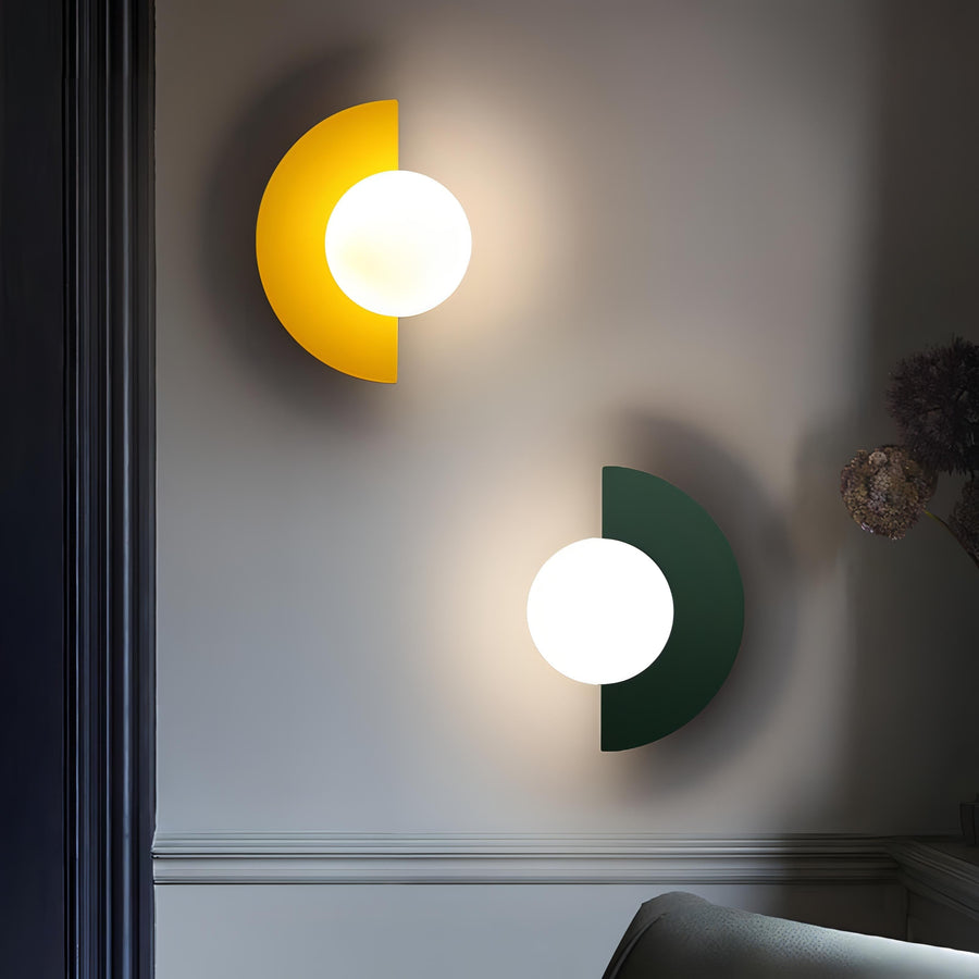 Wall lamp glowing with warm white light in a hallway